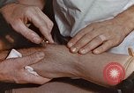 Image of wounded Marines Pacific Ocean, 1945, second 48 stock footage video 65675059750