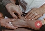 Image of wounded Marines Pacific Ocean, 1945, second 50 stock footage video 65675059750