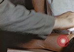 Image of wounded Marines Pacific Ocean, 1945, second 55 stock footage video 65675059750