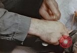 Image of wounded Marines Pacific Ocean, 1945, second 58 stock footage video 65675059750