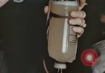 Image of wounded Marines Pacific Ocean, 1945, second 62 stock footage video 65675059750