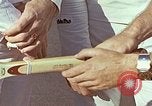 Standbild Tennis champion Bobbie Riggs demonstriert Schläger Grip Waikiki Hawaii USA, 1945, aus Sekunde 11 historischem Filmmaterial Videoclip 65675059779