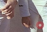 Standbild Tennis champion Bobbie Riggs demonstriert Schläger Grip Waikiki Hawaii USA, 1945, aus Sekunde 16 historischem Filmmaterial Videoclip 65675059779