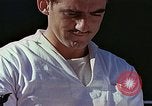 Standbild Tennis champion Bobbie Riggs demonstriert Schläger Grip Waikiki Hawaii USA, 1945, aus Sekunde 22 historischem Filmmaterial Videoclip 65675059779