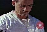 Standbild Tennis champion Bobbie Riggs demonstriert Schläger Grip Waikiki Hawaii USA, 1945, aus Sekunde 23 historischem Filmmaterial Videoclip 65675059779