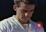 Standbild Tennis champion Bobbie Riggs demonstriert Schläger Grip Waikiki Hawaii USA, 1945, aus Sekunde 27 historischem Filmmaterial Videoclip 65675059779