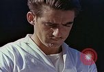 Standbild Tennis champion Bobbie Riggs demonstriert Schläger Grip Waikiki Hawaii USA, 1945, aus Sekunde 28 historischem Filmmaterial Videoclip 65675059779