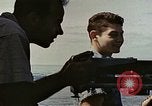 Image of machine gun Pacific Ocean, 1945, second 4 stock footage video 65675059780