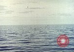 Image of machine gun Pacific Ocean, 1945, second 8 stock footage video 65675059780