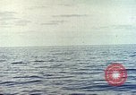 Image of machine gun Pacific Ocean, 1945, second 9 stock footage video 65675059780