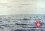 Image of machine gun Pacific Ocean, 1945, second 10 stock footage video 65675059780