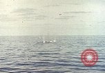 Image of machine gun Pacific Ocean, 1945, second 16 stock footage video 65675059780