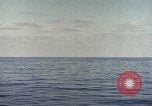 Image of machine gun Pacific Ocean, 1945, second 21 stock footage video 65675059780