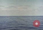 Image of machine gun Pacific Ocean, 1945, second 23 stock footage video 65675059780