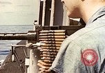 Image of machine gun Pacific Ocean, 1945, second 28 stock footage video 65675059780