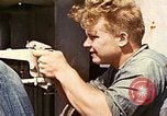 Image of machine gun Pacific Ocean, 1945, second 33 stock footage video 65675059780