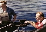 Image of machine gun Pacific Ocean, 1945, second 36 stock footage video 65675059780