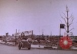 Image of WW2 bombing damage and Imperial Palace grounds Tokyo Japan, 1945, second 6 stock footage video 65675059786