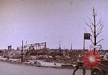 Image of WW2 bombing damage and Imperial Palace grounds Tokyo Japan, 1945, second 12 stock footage video 65675059786