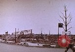 Image of WW2 bombing damage and Imperial Palace grounds Tokyo Japan, 1945, second 13 stock footage video 65675059786