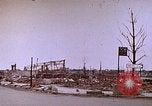 Image of WW2 bombing damage and Imperial Palace grounds Tokyo Japan, 1945, second 14 stock footage video 65675059786
