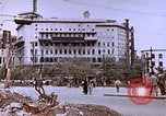 Image of WW2 bombing damage and Imperial Palace grounds Tokyo Japan, 1945, second 46 stock footage video 65675059786