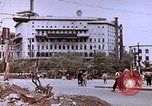 Image of WW2 bombing damage and Imperial Palace grounds Tokyo Japan, 1945, second 48 stock footage video 65675059786