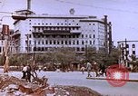 Image of WW2 bombing damage and Imperial Palace grounds Tokyo Japan, 1945, second 53 stock footage video 65675059786