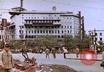 Image of WW2 bombing damage and Imperial Palace grounds Tokyo Japan, 1945, second 59 stock footage video 65675059786
