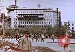 Image of WW2 bombing damage and Imperial Palace grounds Tokyo Japan, 1945, second 60 stock footage video 65675059786