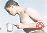 Image of United States airmen brushing teeth Corsica France, 1944, second 10 stock footage video 65675059794