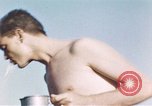 Image of United States airmen brushing teeth Corsica France, 1944, second 16 stock footage video 65675059794