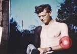 Image of United States airmen brushing teeth Corsica France, 1944, second 34 stock footage video 65675059794