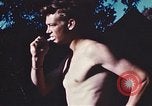 Image of United States airmen brushing teeth Corsica France, 1944, second 48 stock footage video 65675059794