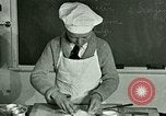 Standbild Kochkurse für amerikanischen Jungen und Mädchen United States USA, 1923, aus Sekunde 45 historischem Filmmaterial Videoclip 65675059847