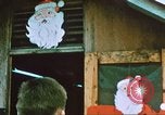 Image of troops celebrate Christmas Vietnam, 1968, second 3 stock footage video 65675059895
