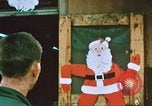 Image of troops celebrate Christmas Vietnam, 1968, second 4 stock footage video 65675059895