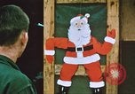 Image of troops celebrate Christmas Vietnam, 1968, second 5 stock footage video 65675059895