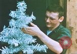 Image of troops celebrate Christmas Vietnam, 1968, second 9 stock footage video 65675059895