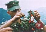 Image of troops celebrate Christmas Vietnam, 1968, second 26 stock footage video 65675059895