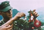 Image of troops celebrate Christmas Vietnam, 1968, second 27 stock footage video 65675059895