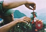 Image of troops celebrate Christmas Vietnam, 1968, second 31 stock footage video 65675059895