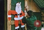 Image of troops celebrate Christmas Vietnam, 1968, second 32 stock footage video 65675059895