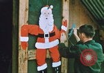 Image of troops celebrate Christmas Vietnam, 1968, second 33 stock footage video 65675059895