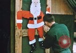 Image of troops celebrate Christmas Vietnam, 1968, second 36 stock footage video 65675059895