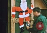 Image of troops celebrate Christmas Vietnam, 1968, second 37 stock footage video 65675059895