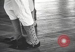 Image of standing watch United States USA, 1943, second 5 stock footage video 65675059920