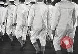 Image of standing watch United States USA, 1943, second 11 stock footage video 65675059920