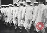 Image of standing watch United States USA, 1943, second 12 stock footage video 65675059920