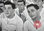 Image of standing watch United States USA, 1943, second 26 stock footage video 65675059920